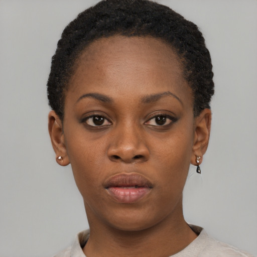 Neutral black young-adult female with short  brown hair and brown eyes