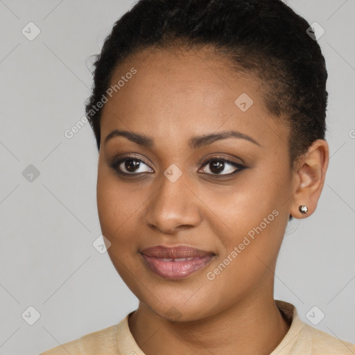 Joyful black young-adult female with short  brown hair and brown eyes