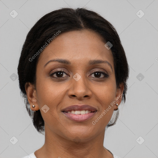 Joyful black young-adult female with medium  brown hair and brown eyes