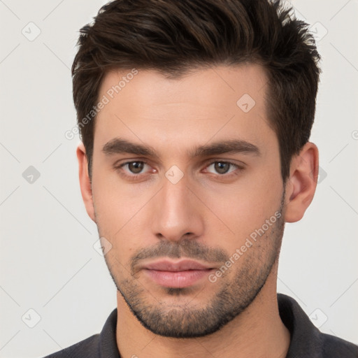 Neutral white young-adult male with short  brown hair and brown eyes