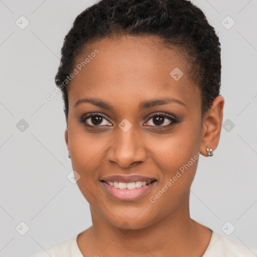 Joyful black young-adult female with short  brown hair and brown eyes