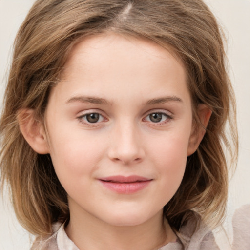 Joyful white child female with medium  brown hair and grey eyes