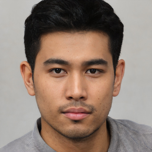 Neutral asian young-adult male with short  black hair and brown eyes