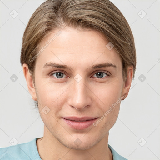 Joyful white young-adult female with short  brown hair and grey eyes