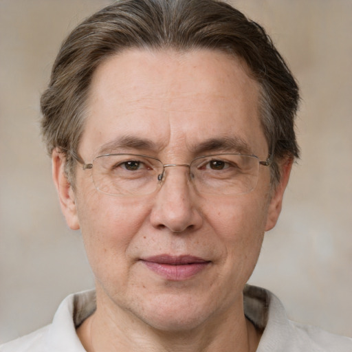 Joyful white middle-aged male with short  brown hair and brown eyes