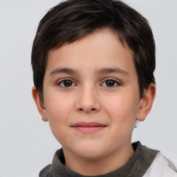 Joyful white child male with short  brown hair and brown eyes