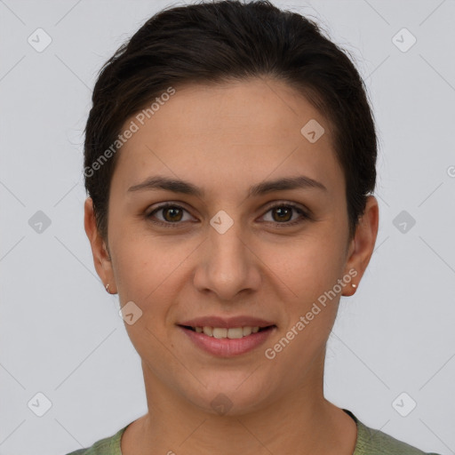 Joyful white young-adult female with short  brown hair and brown eyes