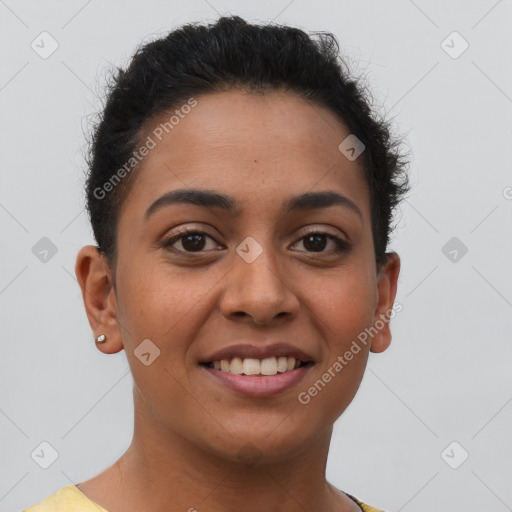 Joyful latino young-adult female with short  brown hair and brown eyes