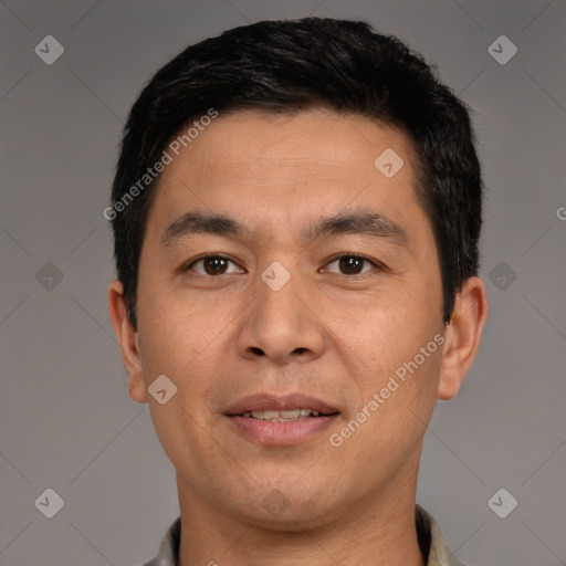 Joyful white young-adult male with short  black hair and brown eyes
