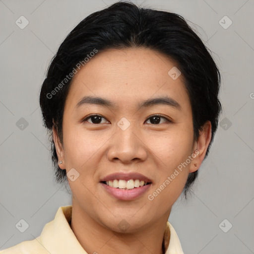 Joyful asian young-adult female with medium  black hair and brown eyes