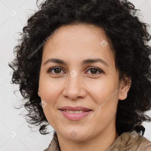 Joyful white adult female with long  brown hair and brown eyes