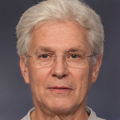 Neutral white middle-aged male with short  gray hair and brown eyes