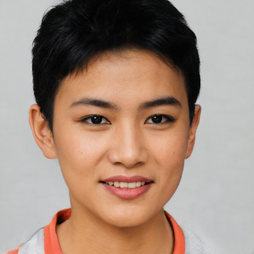 Joyful asian young-adult female with short  black hair and brown eyes