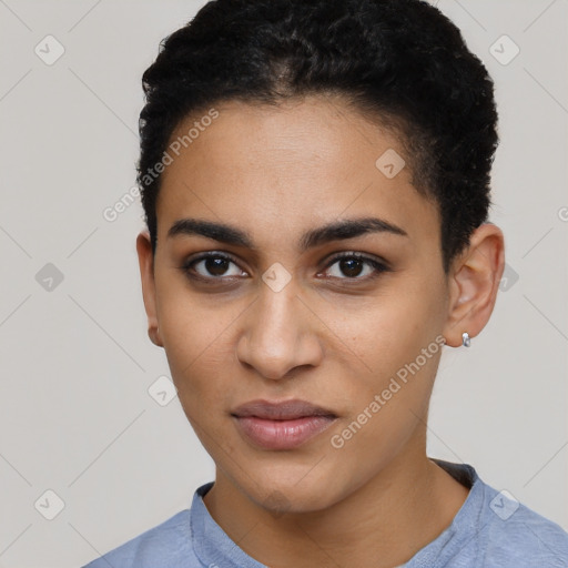 Joyful latino young-adult female with short  brown hair and brown eyes