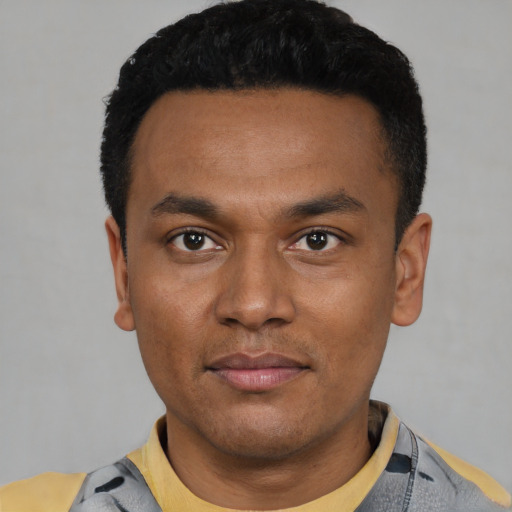 Neutral latino young-adult male with short  black hair and brown eyes