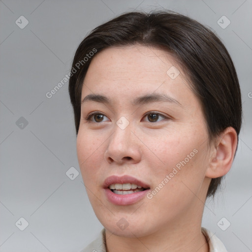 Joyful white young-adult female with medium  brown hair and brown eyes