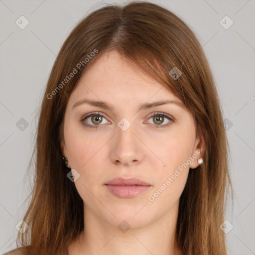 Neutral white young-adult female with long  brown hair and brown eyes