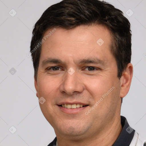 Joyful white young-adult male with short  brown hair and brown eyes