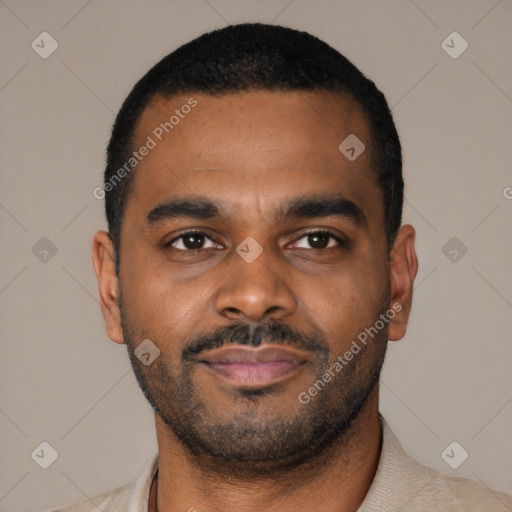 Joyful latino young-adult male with short  brown hair and brown eyes