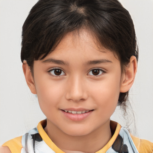 Joyful white child female with short  brown hair and brown eyes