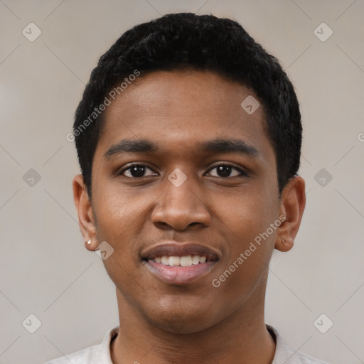 Joyful black young-adult male with short  black hair and brown eyes