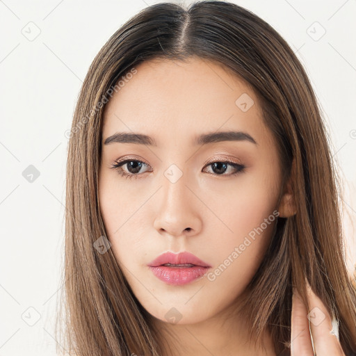 Neutral white young-adult female with long  brown hair and brown eyes