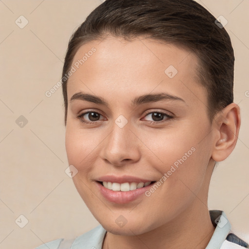 Joyful white young-adult female with short  brown hair and brown eyes