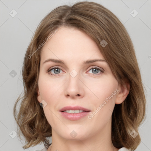 Joyful white young-adult female with medium  brown hair and green eyes