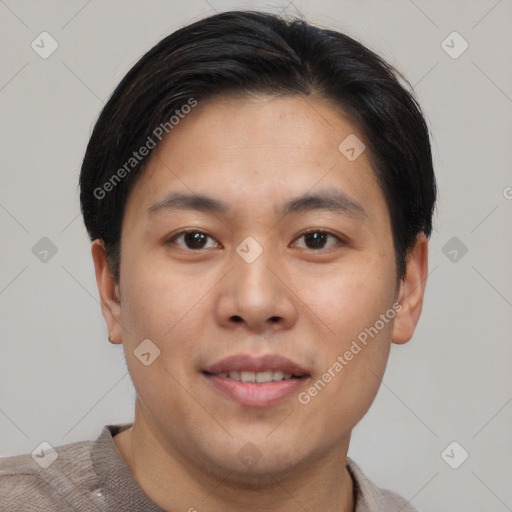 Joyful asian young-adult male with short  brown hair and brown eyes