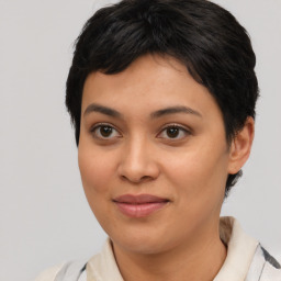 Joyful asian young-adult female with medium  brown hair and brown eyes