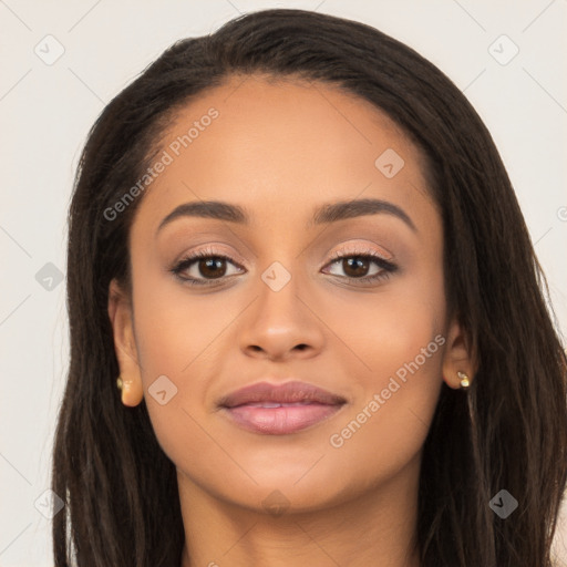 Joyful latino young-adult female with long  brown hair and brown eyes