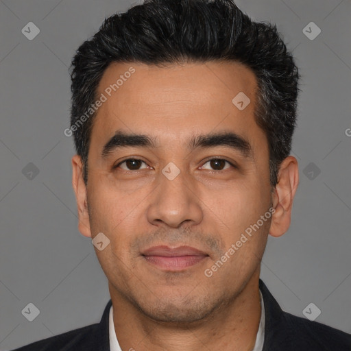 Joyful white adult male with short  black hair and brown eyes