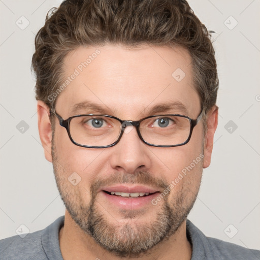 Joyful white adult male with short  brown hair and grey eyes