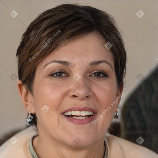 Joyful white adult female with short  brown hair and brown eyes