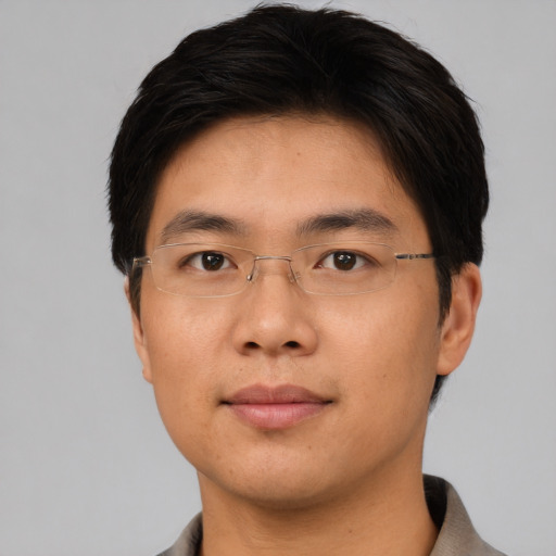 Neutral asian young-adult male with short  brown hair and brown eyes
