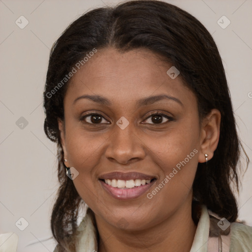 Joyful latino young-adult female with medium  brown hair and brown eyes