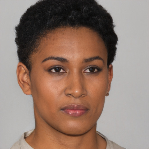 Neutral black young-adult female with short  brown hair and brown eyes