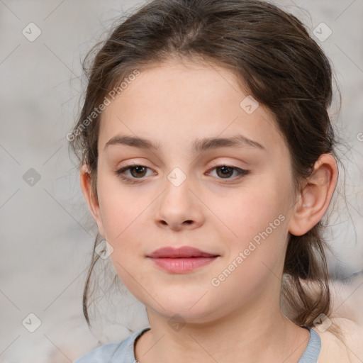 Joyful white child female with medium  brown hair and brown eyes