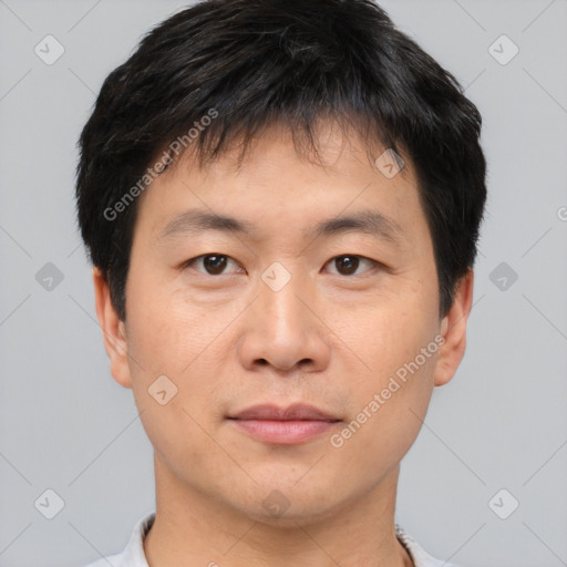 Neutral asian young-adult male with short  brown hair and brown eyes