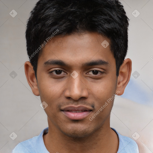 Joyful latino young-adult male with short  black hair and brown eyes