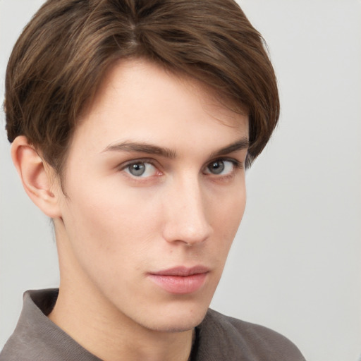 Neutral white young-adult male with short  brown hair and grey eyes