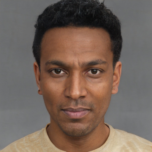 Neutral latino young-adult male with short  black hair and brown eyes