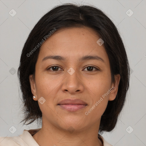 Joyful latino young-adult female with medium  brown hair and brown eyes