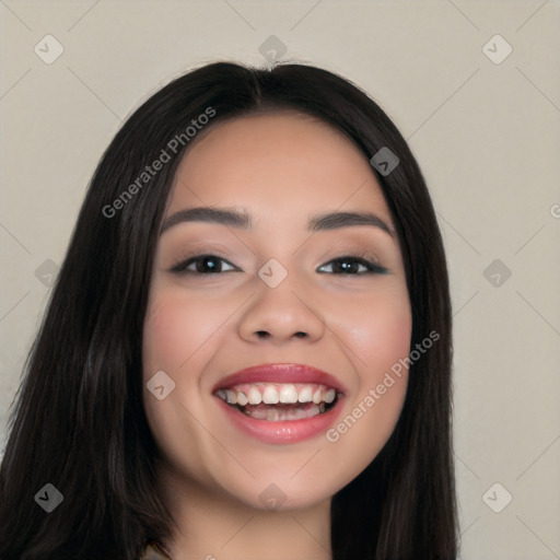 Joyful white young-adult female with long  black hair and brown eyes