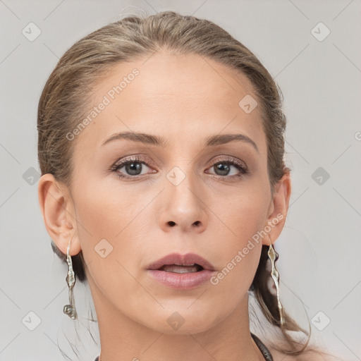 Neutral white young-adult female with medium  brown hair and grey eyes