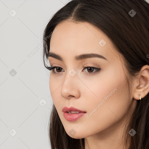 Neutral white young-adult female with long  brown hair and brown eyes