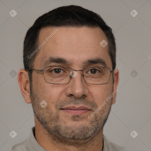 Joyful white adult male with short  brown hair and brown eyes