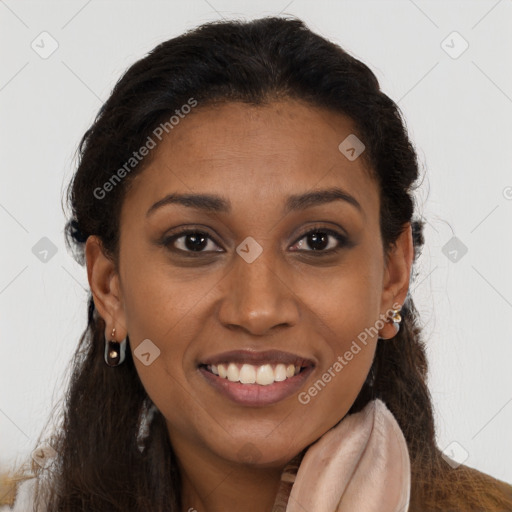 Joyful black young-adult female with long  brown hair and brown eyes