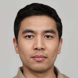 Neutral asian young-adult male with short  black hair and brown eyes