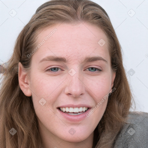 Joyful white young-adult female with long  brown hair and blue eyes